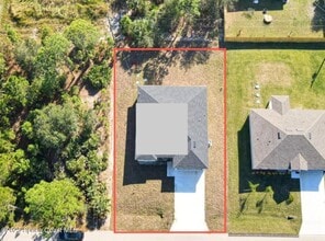 410 Flat River St SW in Palm Bay, FL - Building Photo - Building Photo