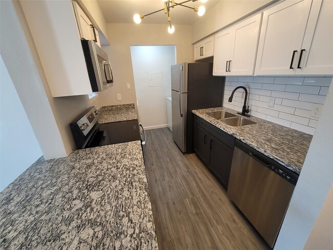 property at 2701 W Bellfort Ave