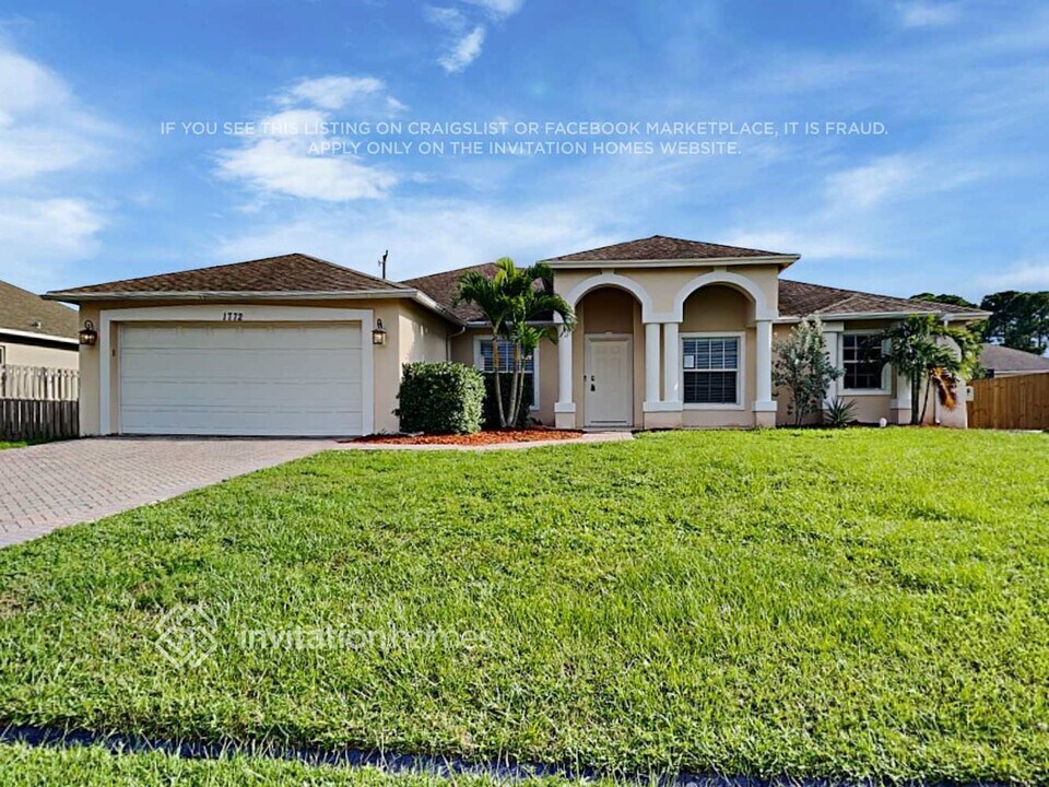 1772 SW Lofgren Ave in Port St. Lucie, FL - Building Photo