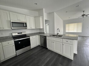 7 Malauka Pass Dr in Ocklawaha, FL - Building Photo - Building Photo