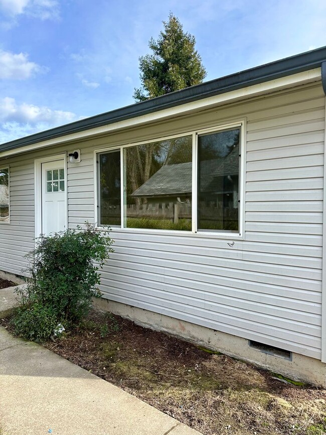property at 411 SE Denver St
