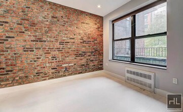 Stanton Street, Unit 6A in New York, NY - Building Photo - Building Photo