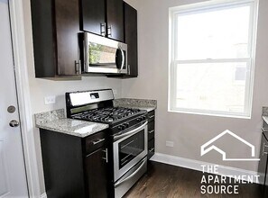 1437 W Carmen Ave, Unit 1F in Chicago, IL - Building Photo - Building Photo