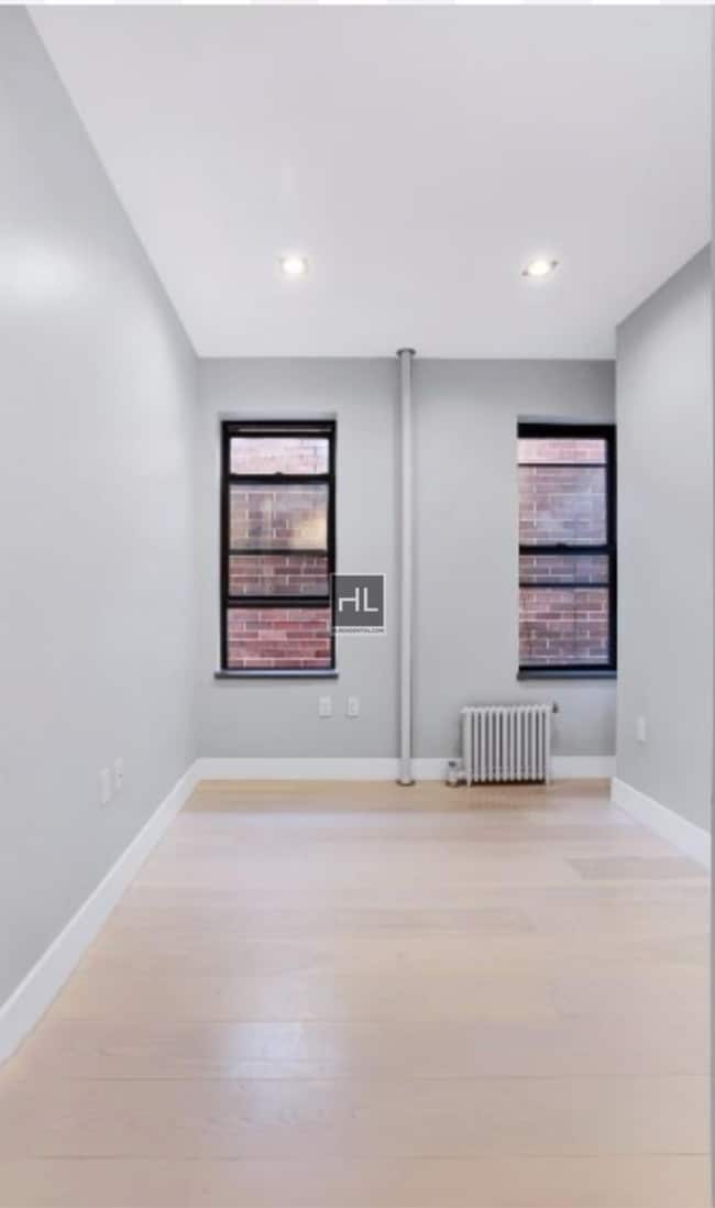 Stanton Street, Unit 5F in New York, NY - Building Photo - Building Photo