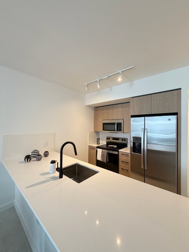 1690 NW 28th Ave, Unit 3G in Miami, FL - Foto de edificio - Building Photo