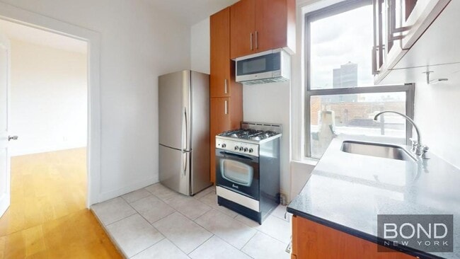 229-231-231 E 12th St in New York, NY - Building Photo - Building Photo