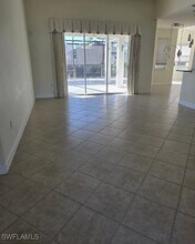 25080 Divot Dr in Bonita Springs, FL - Building Photo - Building Photo