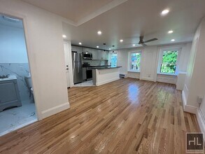 2BR 1BA Classic Details Top Floor Brownstone w/ New Modern Finish on Preserved Bedstuy Block, Unit 3 in Brooklyn, NY - Building Photo - Building Photo