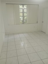 1401 NE 191st St, Unit D111 in Miami, FL - Building Photo - Building Photo