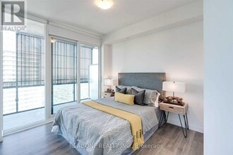 8 Eglinton Ave E in Toronto, ON - Building Photo - Building Photo