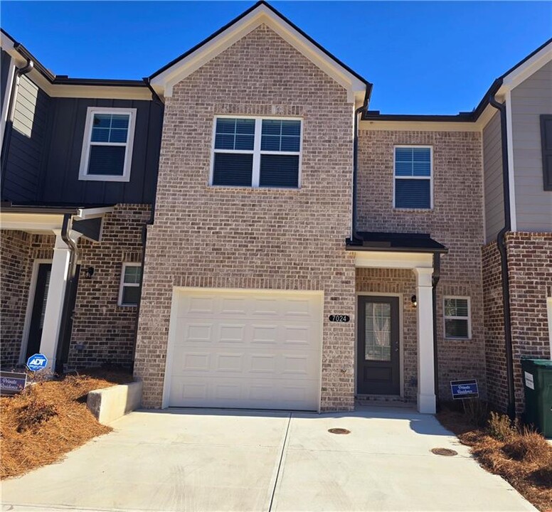 7024 Fringe Flower Dr in Austell, GA - Building Photo