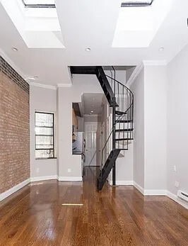 property at 209 E 25th St