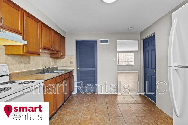 1030 Wild Cherry Ln in University City, MO - Building Photo - Building Photo