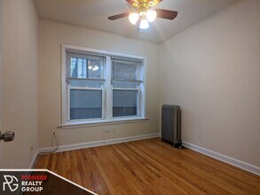 3921 N Pine Grove Ave, Unit W1 in Chicago, IL - Building Photo - Building Photo