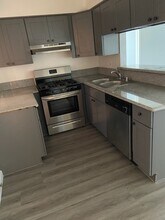 1325 Hoover S St, Unit 301 in Los Angeles, CA - Building Photo - Building Photo