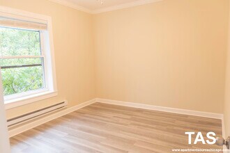 648 W Roscoe St, Unit 2S in Chicago, IL - Building Photo - Building Photo