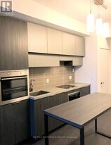 8 Eglinton Ave E in Toronto, ON - Building Photo