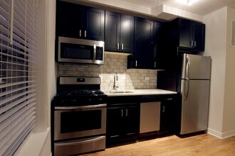 2209 W Eastwood Ave, Unit M02H in Chicago, IL - Building Photo - Building Photo