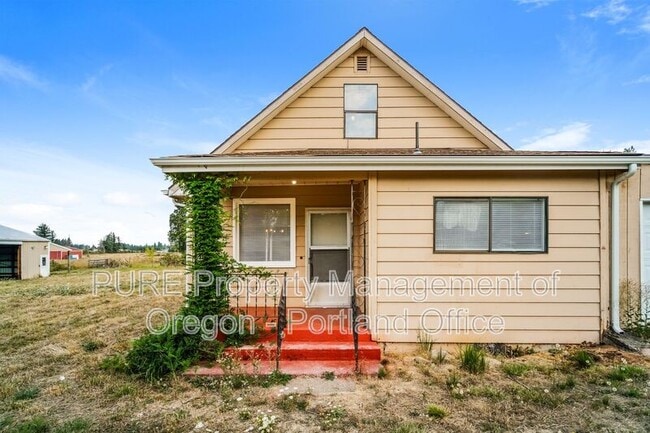 property at 32125 SE Hinman Ave