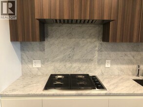 7418 Paulson St in Vancouver, BC - Building Photo - Building Photo