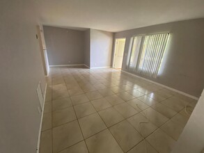 4947 Sable Pine Cir, Unit A1 in West Palm Beach, FL - Building Photo - Building Photo
