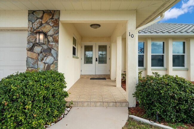 10 Stone Mountain Blvd, Unit 201 in Englewood, FL - Building Photo - Building Photo