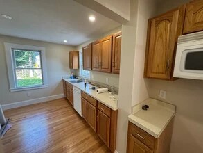 74 Brock St, Unit 1 in Boston, MA - Foto de edificio - Building Photo