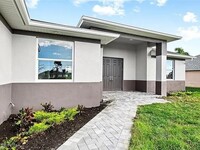 320 NW 17th Pl in Cape Coral, FL - Foto de edificio - Building Photo