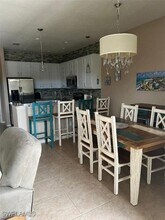 11852 Tulio Way, Unit 1B-227 in Ft. Myers, FL - Foto de edificio - Building Photo