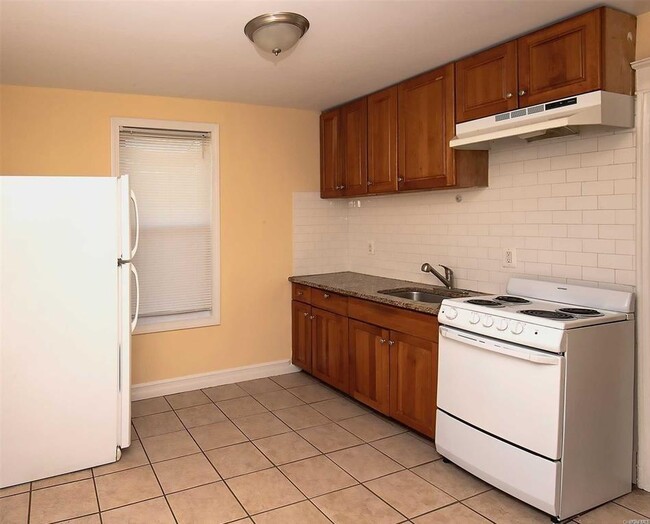 property at 261-10 86th Ave