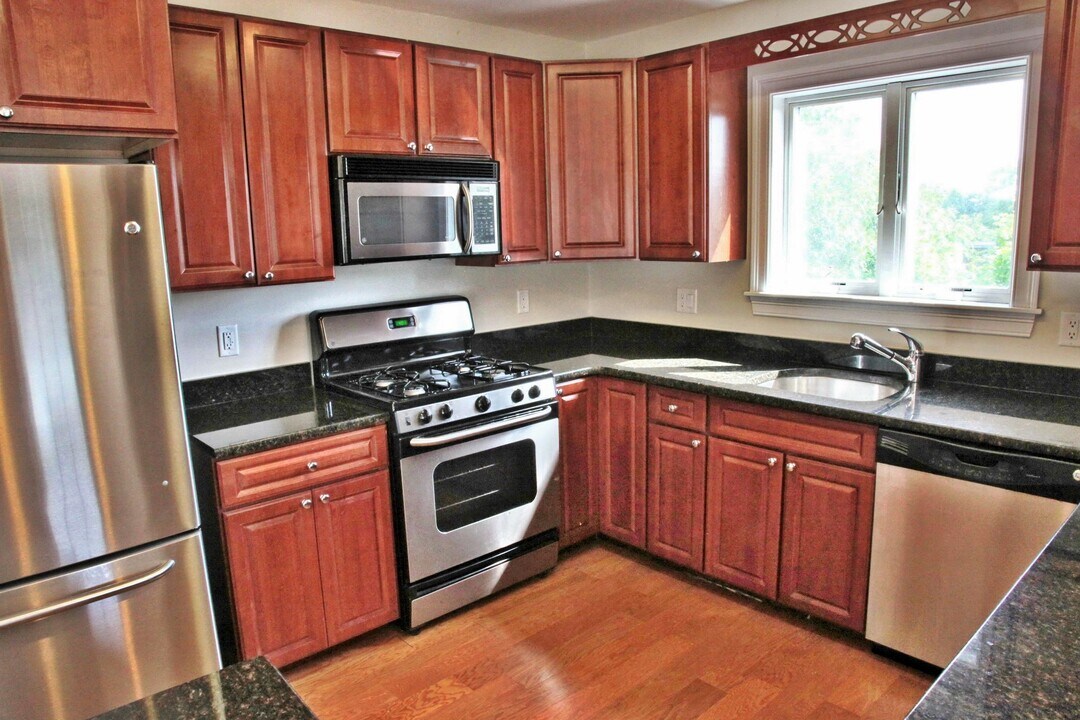 5170 Washington St, Unit 308 in Boston, MA - Building Photo