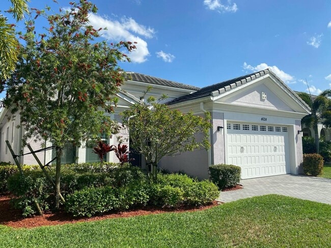 4624 Woodland Wy in Westlake, FL - Building Photo - Building Photo
