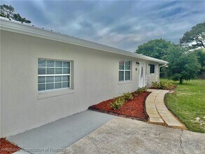 1409 Palm Way in Sebring, FL - Foto de edificio - Building Photo