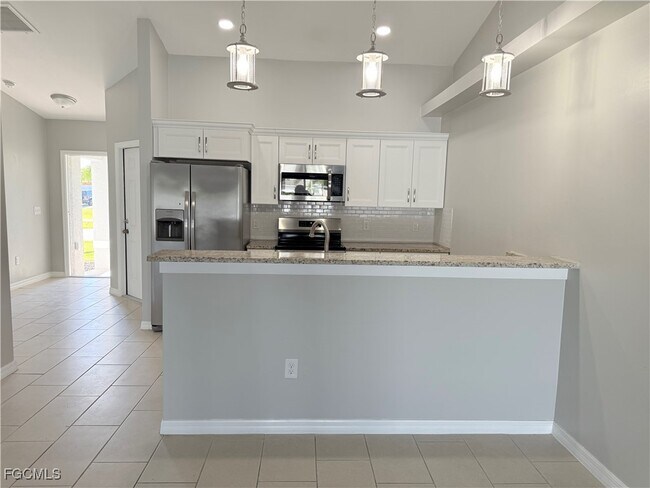 1403 Nelson Rd N in Cape Coral, FL - Building Photo - Building Photo
