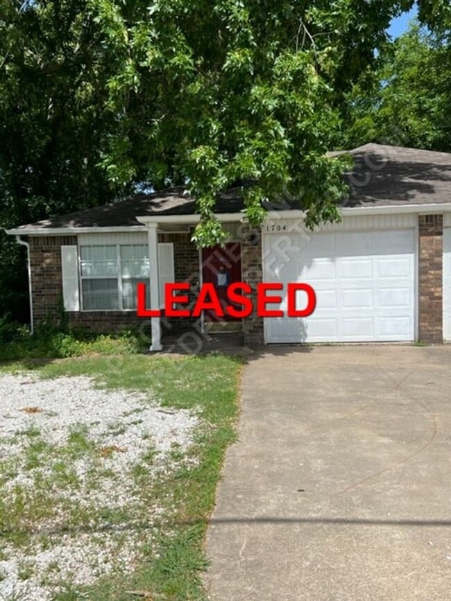 property at 1702-1704 N Lewis Ave