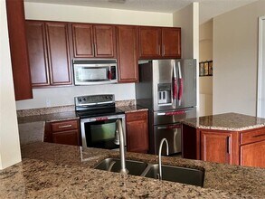 3817 Golden Feather Way in Kissimmee, FL - Building Photo - Building Photo