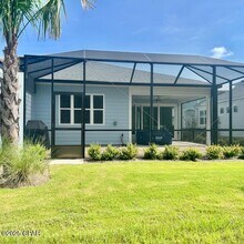 9037 Parrot Pl in Panama City Beach, FL - Building Photo - Building Photo