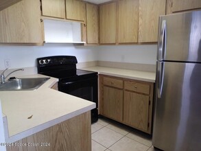 1690 Sunny Brook Ln-Unit -103 in Palm Bay, FL - Building Photo - Building Photo