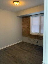 7750 S Essex Ave, Unit Unit 102 in Chicago, IL - Building Photo - Building Photo