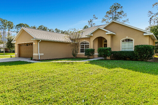 34 Rainbow Ln in Palm Coast, FL - Foto de edificio - Building Photo