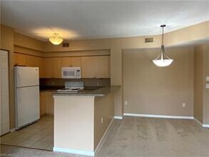 1220 Reserve Way-Unit -205 in Naples, FL - Building Photo - Building Photo