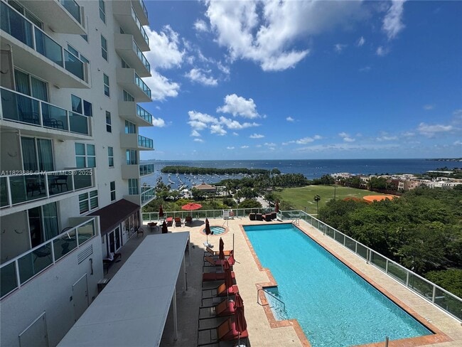 2889 McFarlane Rd, Unit 1016 in Miami, FL - Building Photo - Building Photo