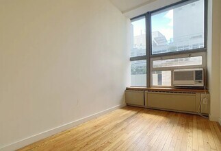 102 Fulton St in New York, NY - Building Photo - Building Photo