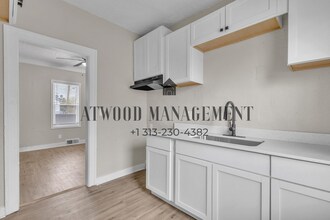 This beautifully updated 4-bedroom, 2-bath single-family home is ready for move-in! in Detroit, MI - Building Photo - Building Photo