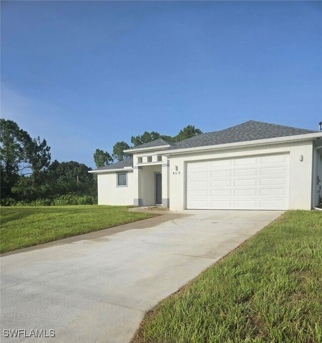 409 Limerick Ave S in Lehigh Acres, FL - Building Photo - Building Photo
