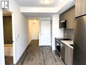 7439 Kingston Rd in Toronto, ON - Building Photo - Building Photo