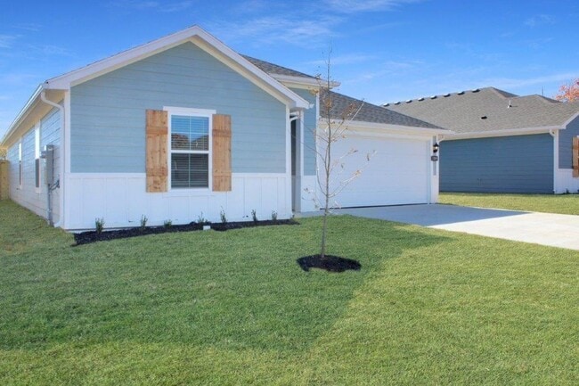 property at 106 NW Pinwheel St