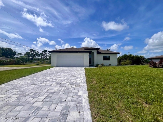 2401 Atlantic Cir in Lehigh Acres, FL - Building Photo - Building Photo