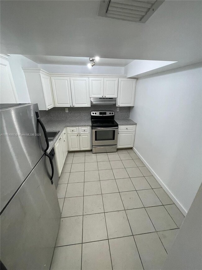 property at 711 N Pine Island Rd