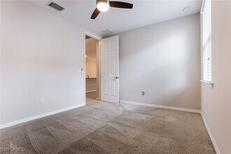 14533 Edgewater Cir in Naples, FL - Building Photo - Building Photo